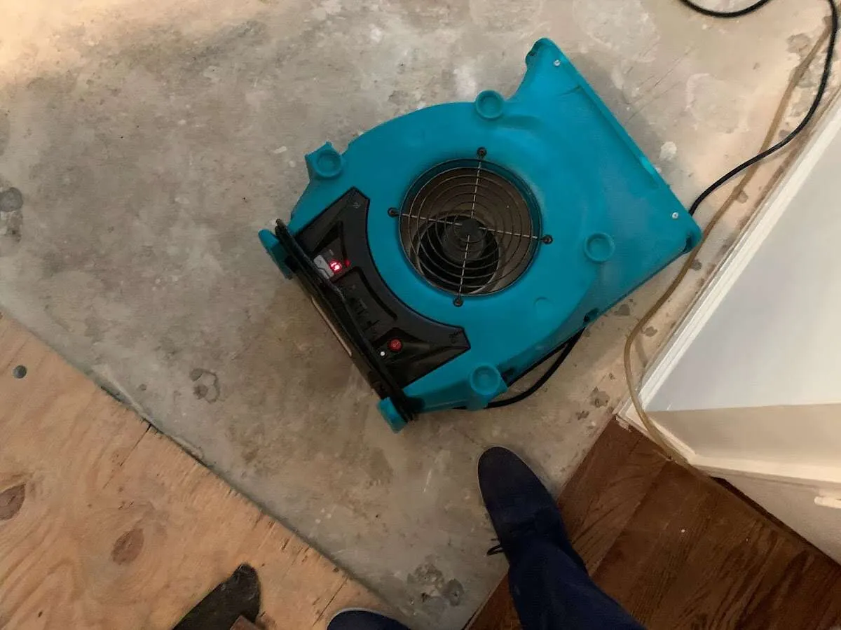 Air mover drying subfloor during Leak Detection & Repair in Aiken